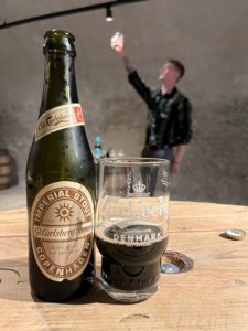 In the Carlsberg cellars: Old Carlsberg Porter in a glass with a bottle